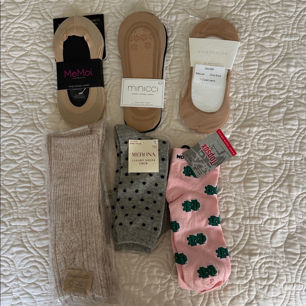 Set of six women's socks including Notre dame pink pair.